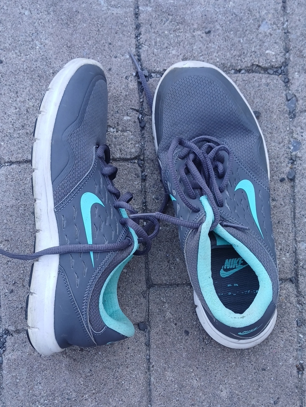 Nike Women’s Gray Sneakers with Teal Swoosh